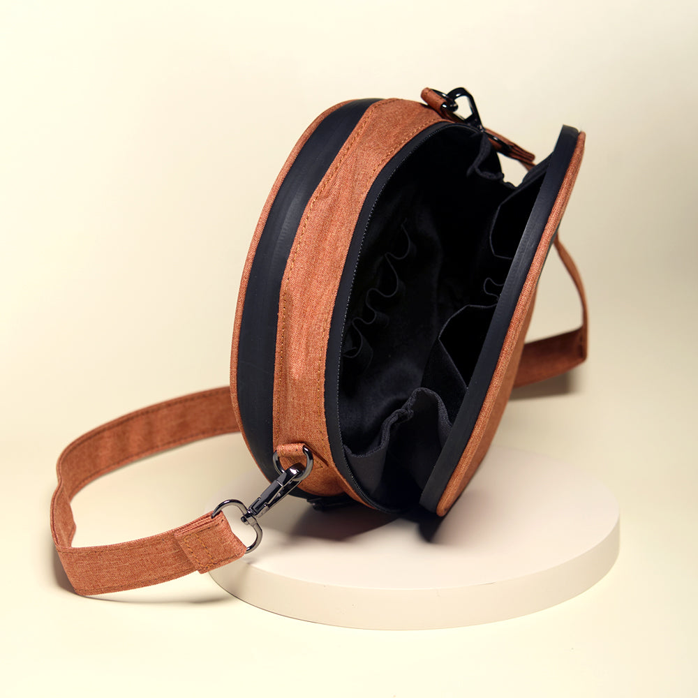 Orange circle bag zipped open