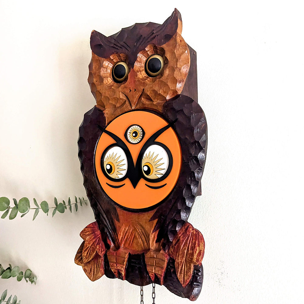 Vintage Japanese Owl Clock with a new face from the side