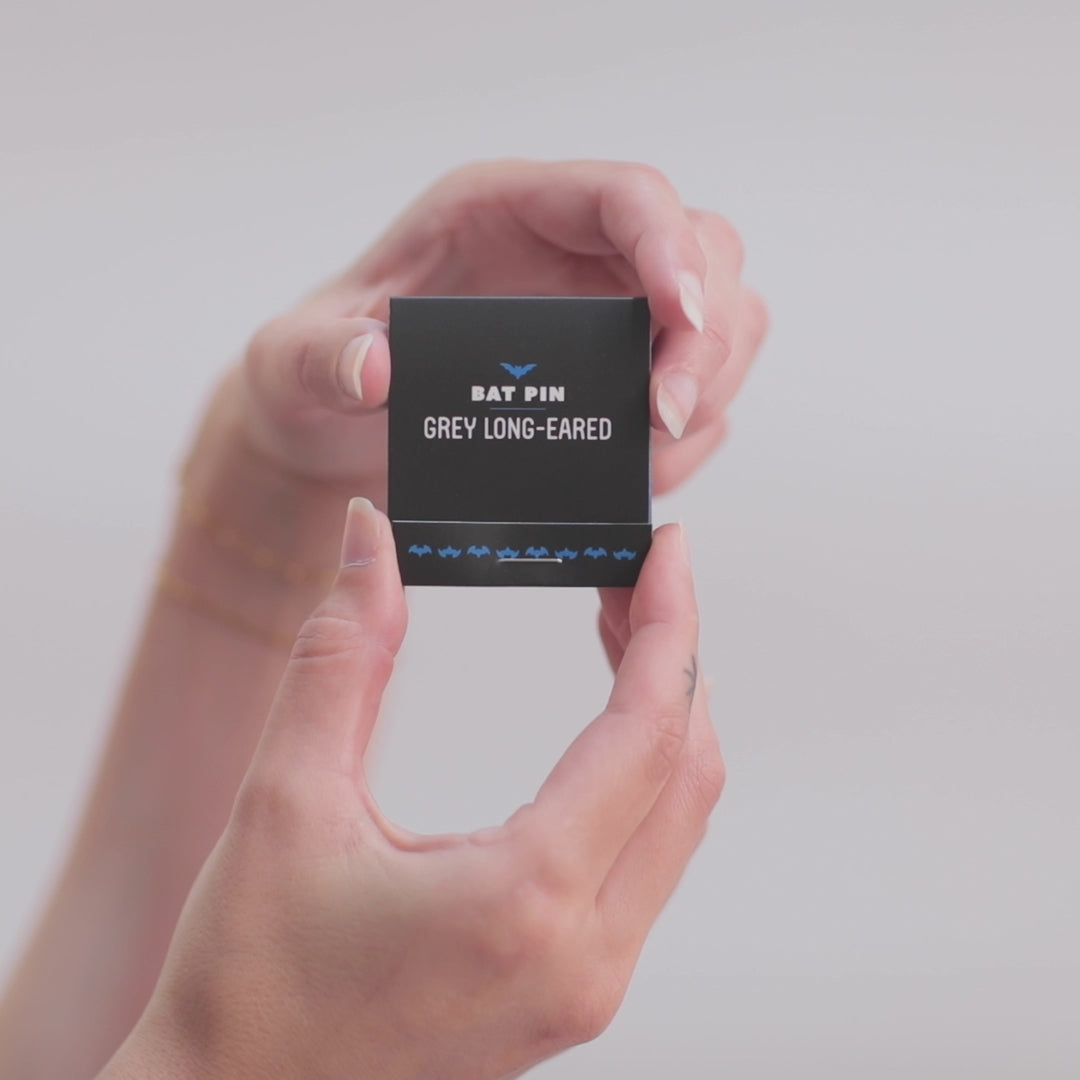 Bat pin matchbook being opened