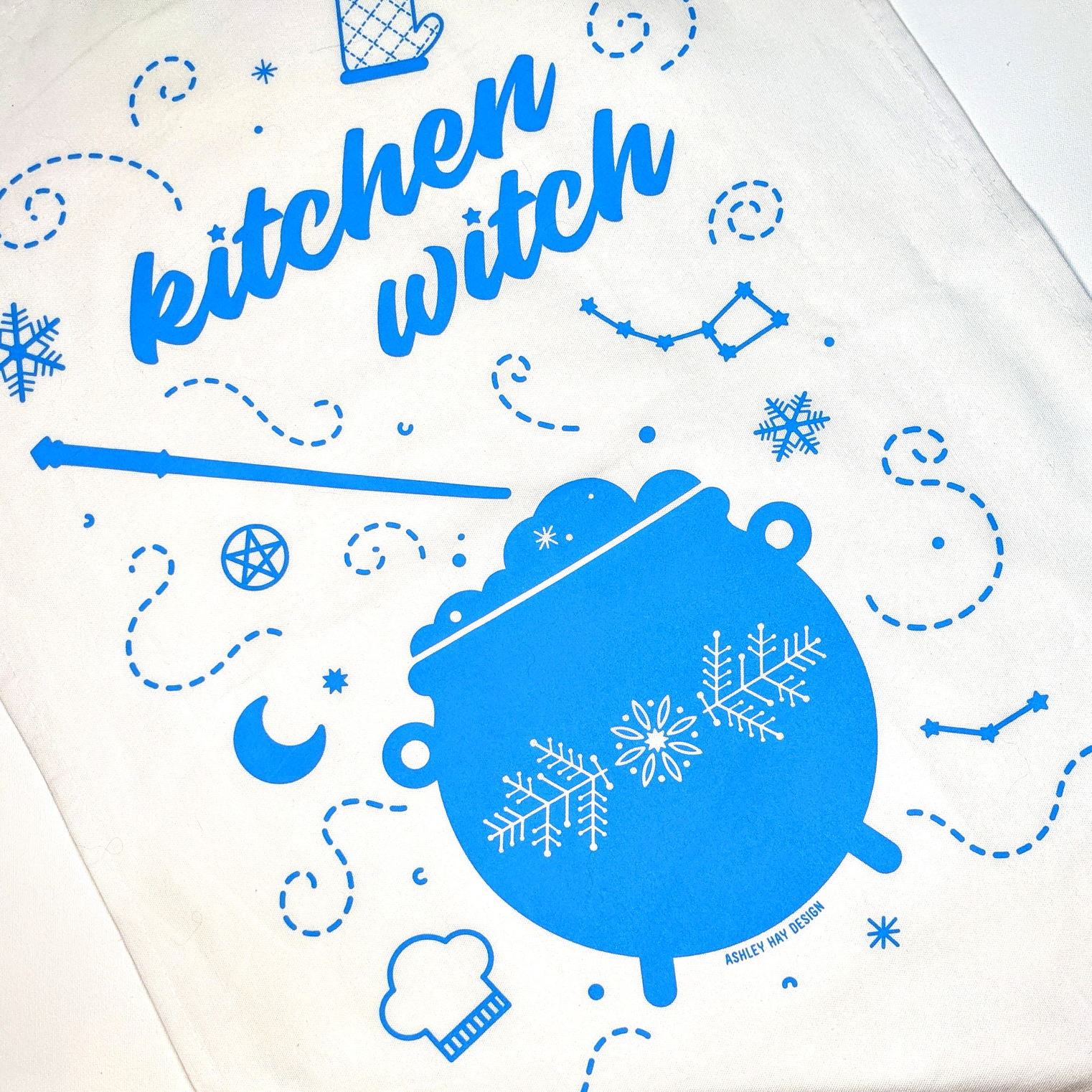 alt="Kitchen Witch winter tea towel flat"