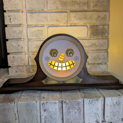 Vintage mantle clock Halloween snowman face lit up