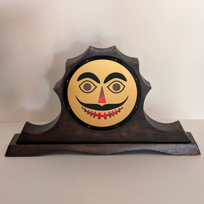 Vintage mantle clock, Halloween face with a mustache lit up