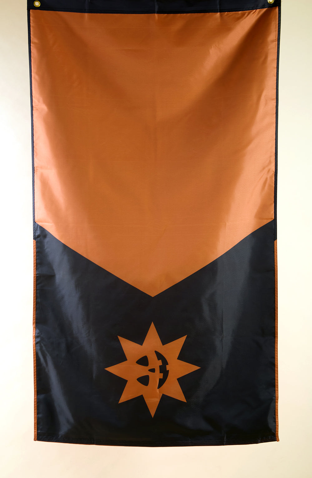 The Minnesota state flag but in orange and black colors with a jack-o-lantern star back