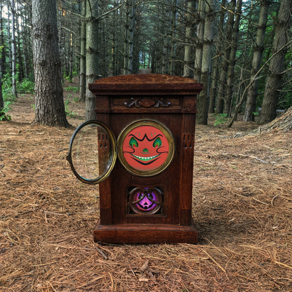 alt="Vintage mantle clock with Halloween face bubble glass"