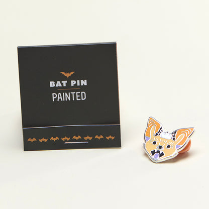 Painted bat enamel pin closed