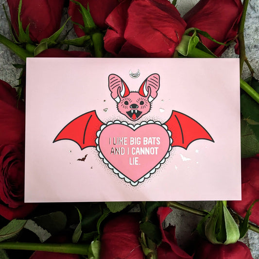 alt="Funny bat valentine card on flowers"