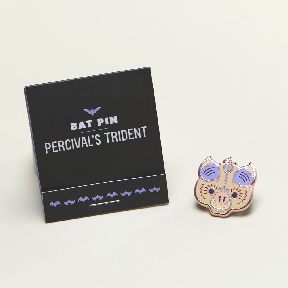 Precival's Trident bat enamel pin closed