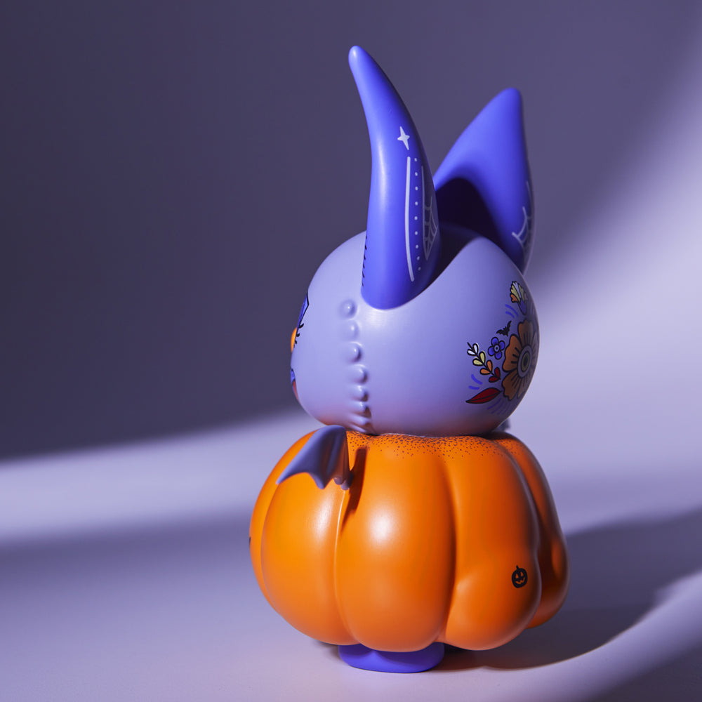 alt="Collectible pumpkin bat figure profile"