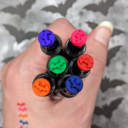 alt="Multicolor bat makeup stamps"